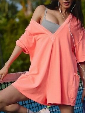 NWT Free People Hot Shot V-Neck Reversible Romper in Neon Coral. Small